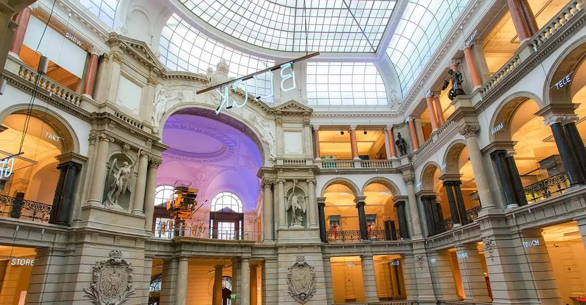 The domed atrium of the Museum of Communication, an affordable museum in Berlin, Germany